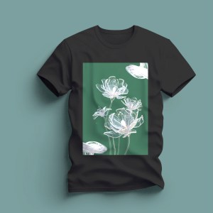 A mockup of a black t-shirt with a green and white lotus design on it